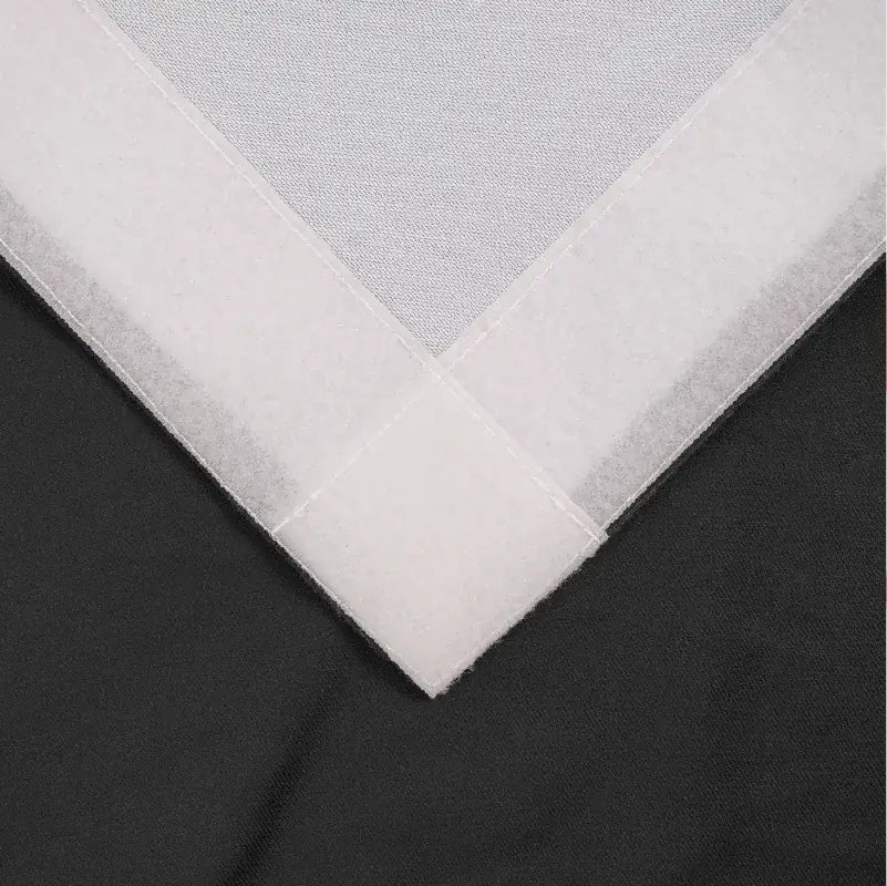 Close-up of printed fabric finishing for a curved pop up display with end caps