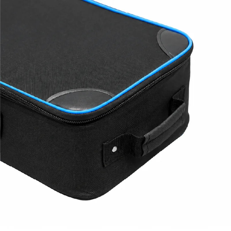 Close-up of the reinforced corner, blue piping and zipper on a black hard carrying case