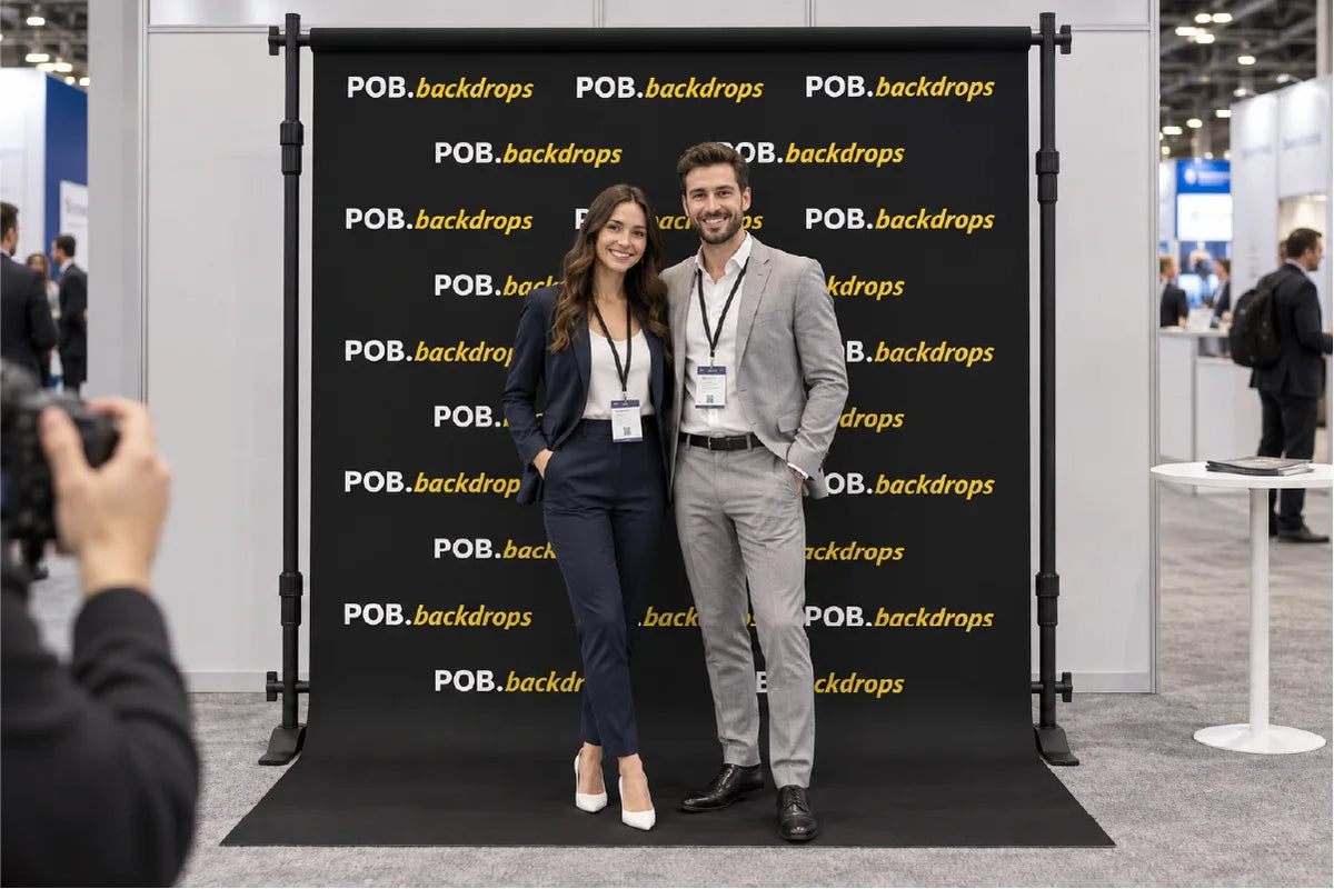 8ft step and repeat banner with floor sweep used as a branded photo backdrop at a trade show