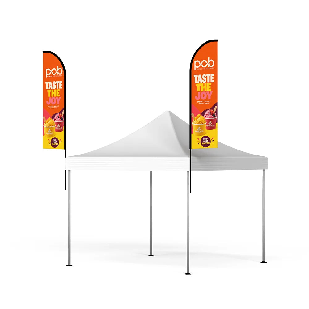 Angled view of two custom printed feather flags mounted above a white pop up canopy tent