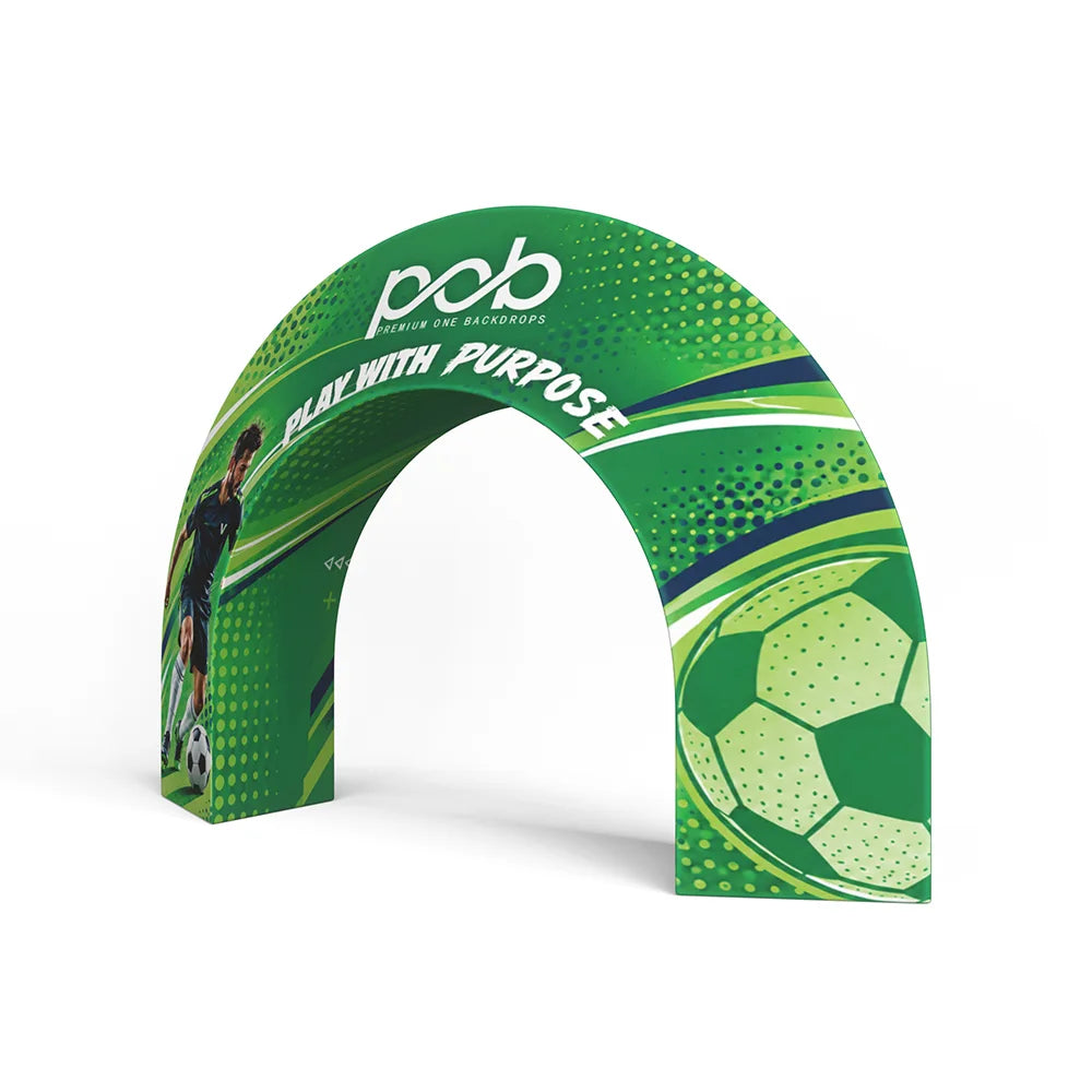 Three-quarter view of a 3D event archway showing its curved structure and large soccer ball graphic