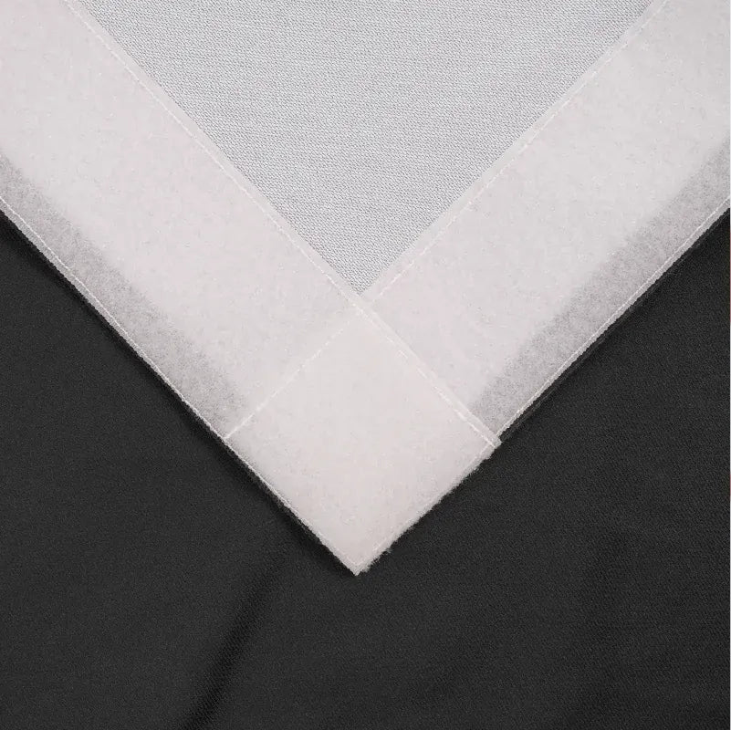 Close-up of the printed fabric edge and finishing on a curved pop up display graphic