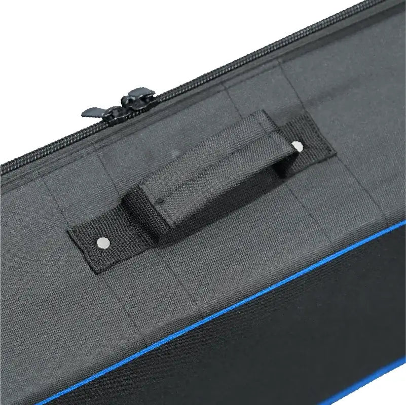 Close-up of the molded side handle, reinforced corner and blue piping on a hard carrying case